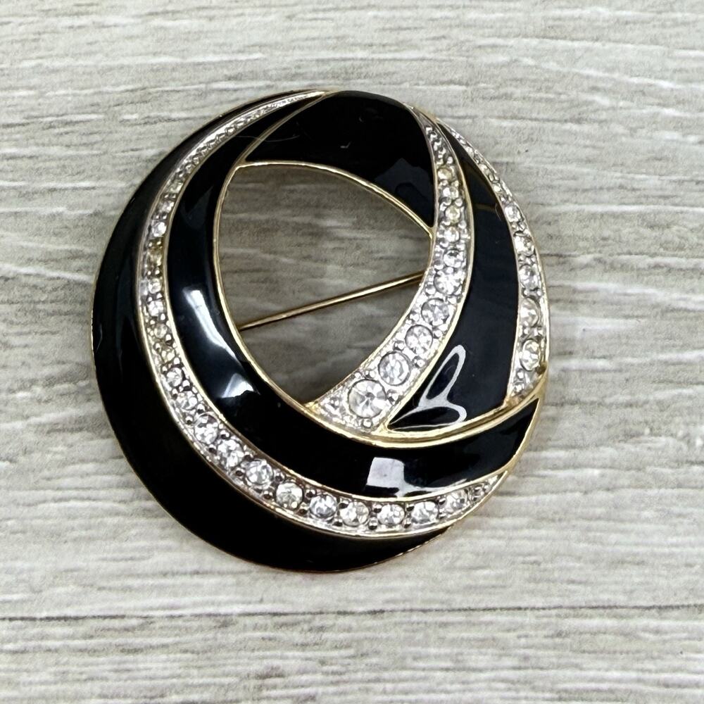 Vintage Trifari Swirl Black Enamel and Rhinestone Circle Brooch